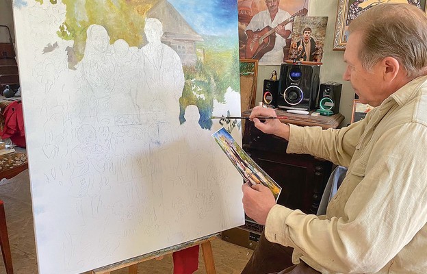 Ukraiński malarz Cukanow przy pracy nad obrazem